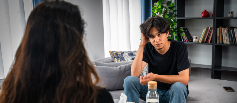 A teenager meets with a therapist to address the mental health impacts of marijuana use.