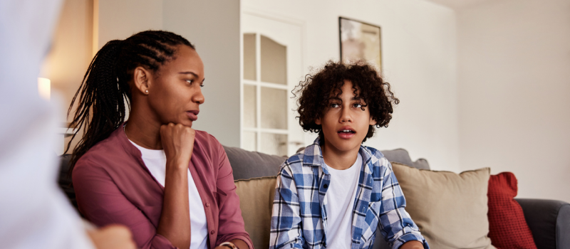 A mother and son are making a mental health emergency plan to prepare for a mental health crisis.