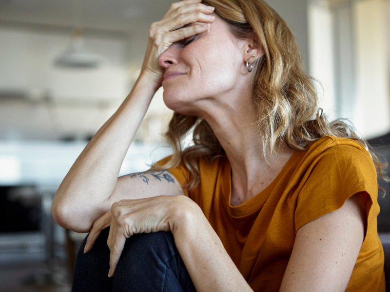 A woman experiences crying for no reason, which could be a sign of a mental health issue.