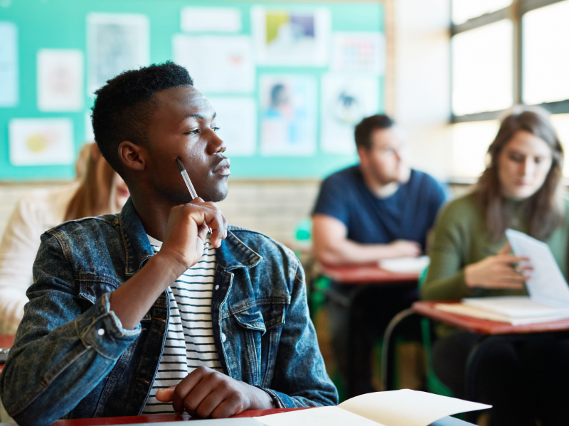 A college student sits in class and dissociates.