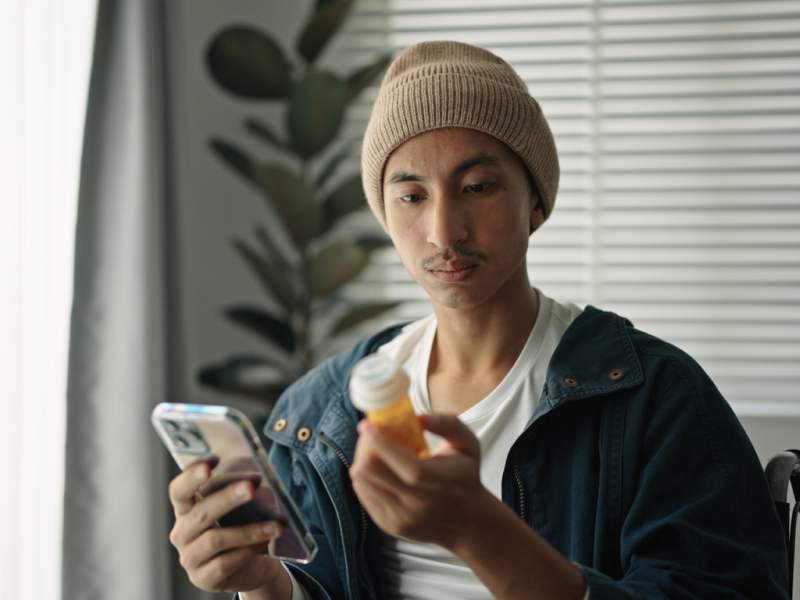 A man looks up on his phone if Prozac is effective for anxiety.