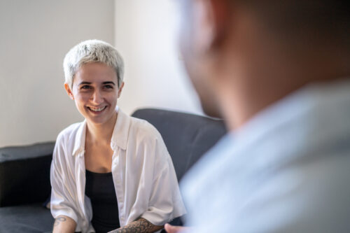 Individual talking to her doctor learning about her the different people who are going to play a role in her therapy