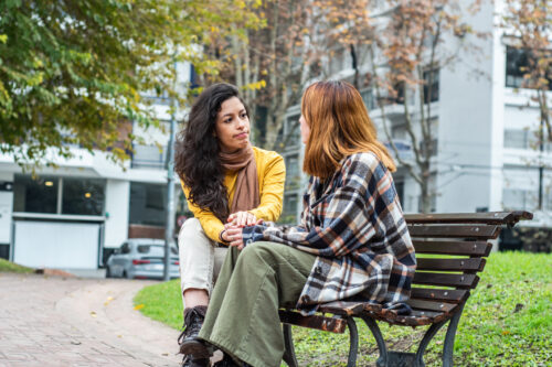 Young women having a difficult conversation