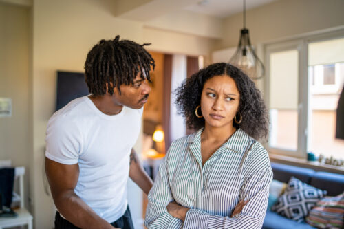 Couple struggling as they try and work out their problems due to their disorganized attachment style