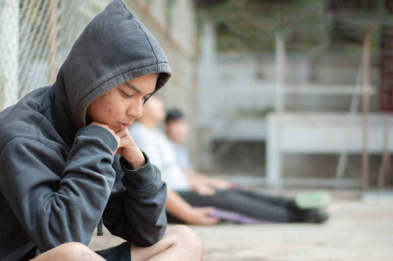 Boy upset and noticing feelings of decreased appetite, excessive worrying, and poor sleep.